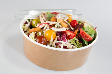 Close up takeaway bowl with fast food salad