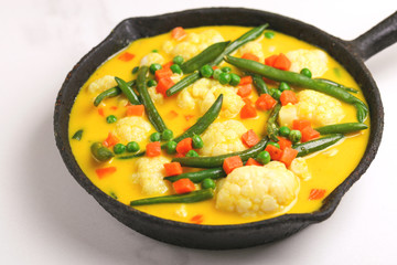 Indian Vegetarian curry Vegetable Korma. Copyspace, horizontal view