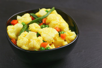 Indian Vegetarian curry Vegetable Korma. Copyspace, horizontal view