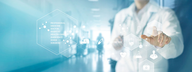 Medicine doctor with stethoscope touching  medical icons network connection with modern virtual screen interface on hospital background. Medical technology network concept