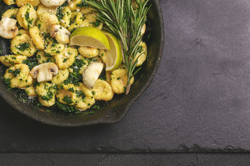 Italian Gnocchi with cream sauce, olives and rosemary