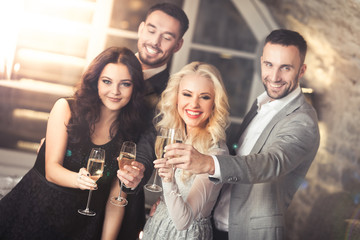 Four friends celebrating