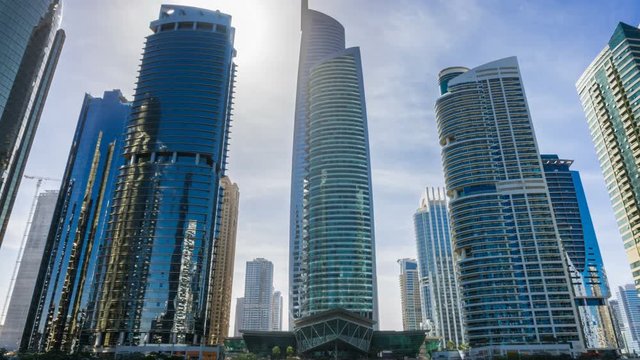 Skyscrapers in Jumeirah Lake Towers, time lapse, Dubai, UAE.