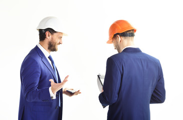 Engineers discuss project.