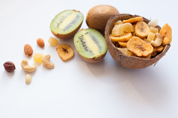 Kiwi and dried fruits in coconut shel