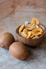 Kiwi and dried fruits in coconut