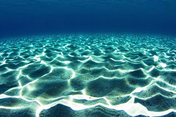 Fototapeta na wymiar Ripples reflected on sandbed in Mediteranean sea