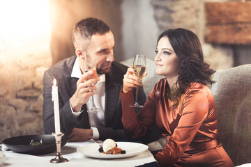 Couple celebrating in restaurant