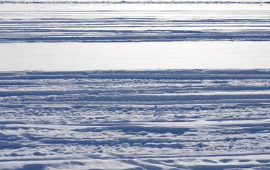 Snow background with traces.
