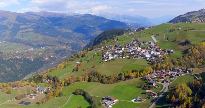 Aerial view in Grisons in the Rhine valley towards Obesaxen on a sunny autumn day in Switzerland