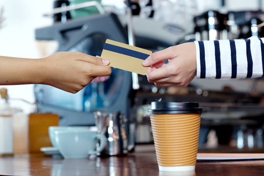 Customer Paying Coffee By Credit, Debit Electronic Card At Cafe Counter, Food And Drink Business Concept