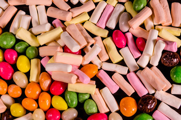 Background of the different multi colored candies. Festive concept