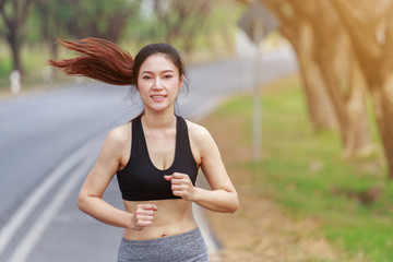 Fototapeta premium fitness woman running in the park