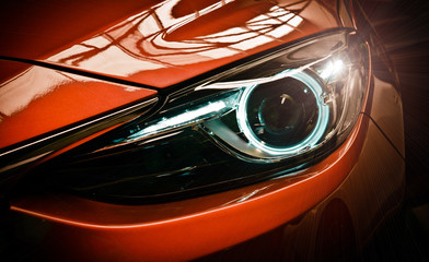 Car headlights. Exterior detail. Car luxury concept