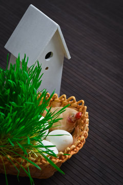 Easter eggs in a green grass nest