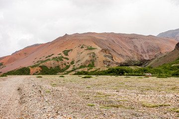 Icelandic landscape with red hills in Lonsoraefi