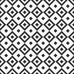 Abstract seamless pattern. Repeating geometric tiles with rhombuses.