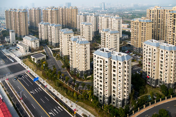 Obraz premium aerial view of the district in Shanghai with roads and high-rise buildings