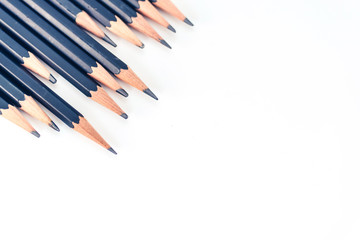 black pencils isolated on white background.Close up.