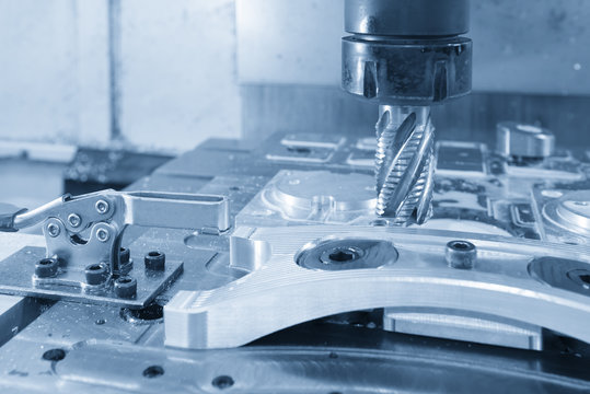 The CNC milling machine cutting the automobile  part by solid rough cutting tool.