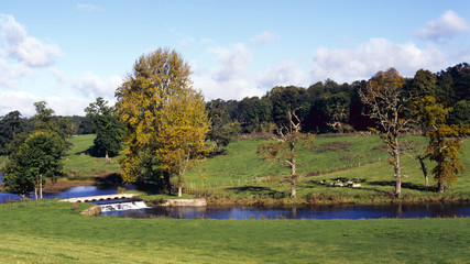 England, Cotswolds, Gloucestershire, peaceful Sherborne Valley autumn colour
