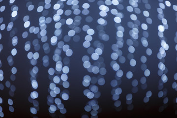 blue bokeh background created by neon lights