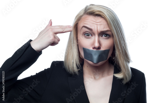 "Девушка с заклеенным ртом на белом фоне" Stock photo and royalty-free ...