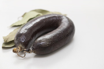 blood sausage morcela on ceramic background