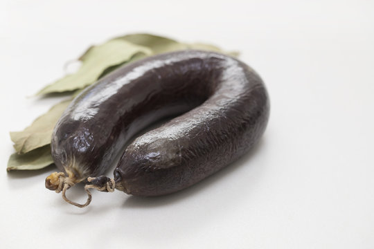 blood sausage morcela on ceramic background