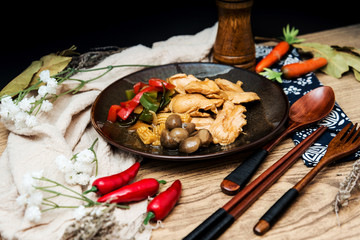 wok fried chicken stir fry with sweet peppers and chinese vegetables