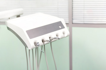 Dental instrument in stomatology clinic. Compressed air and water irrigation nozzle. Professional dentist tools © Kirill Gorlov