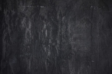 The stone wall concrete textured black background