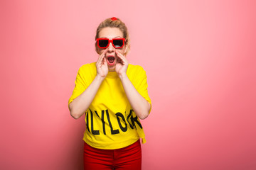 Blonde woman in bright clothes