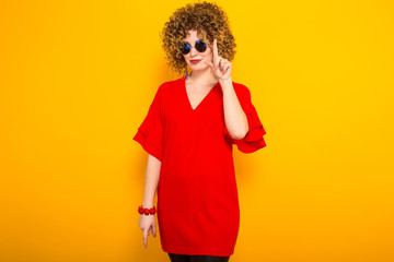 Attractive woman with short curly hair