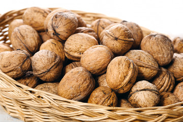 walnuts in small wicker basket