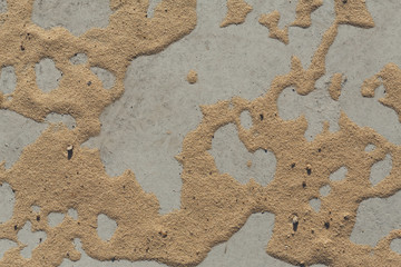Pattern on sand on gray concrete background