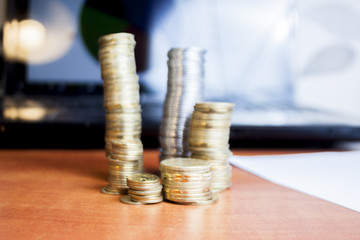 Business diagram on financial report with coins