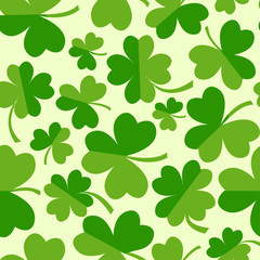 Green seamless pattern with four and tree leaf clovers. Vector illustration
