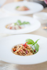 Spaghetti with Thai-style sauce with clams and chilli