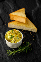 Plate with tasty toasts with honey and cheese