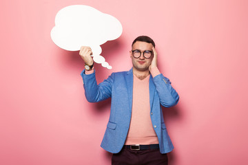 Handsome man in bright jacket with speech bubble