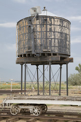 Old water tower next to an abandoned railroad in California 