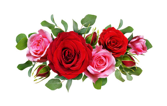 Red and pink rose flowers with eucalyptus leaves in a floral arrangement