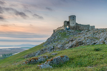 Medieval fortress at sunset on the territory of Romania