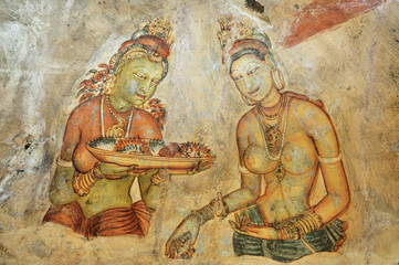 Fototapeta na wymiar Sigiriya Frescoes, paintings of semi-nude women of king Kasyapa's harem at Sigiriya (Lion Rock)