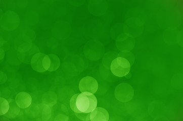 Obraz premium abstract gorgeous bright green bokeh background.