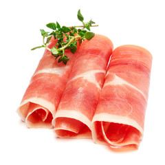 Italian prosciutto crudo or spanish jamon. Raw ham on white background.
