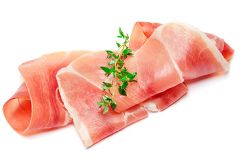 Italian prosciutto crudo or spanish jamon. Raw ham on white background.
