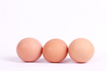 three of egg isolated on white background