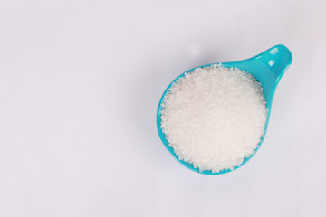 top view sugar in green containers